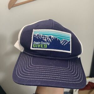 Navy and White Trucker Hat Eagle County Gives